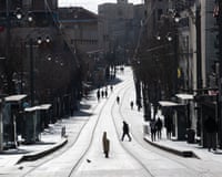 A plume of smoke rises over Tehran after a reported explosion.