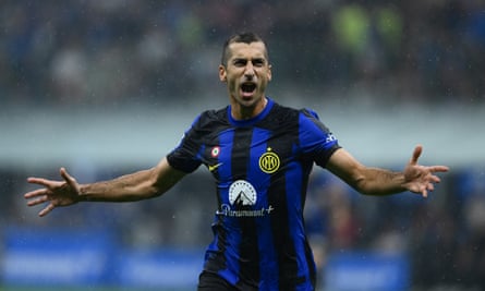 Henrikh Mkhitaryan celebrates after scoring Inter’s third, his second, in the 5-1 Serie A derby victory against Milan. Photograph: Mattia Pistoia/Inter/Getty Images