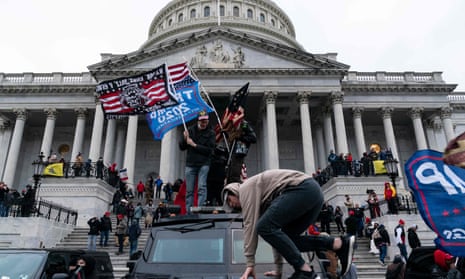 Supporters of Donald Trump riot outside the US Capitol in Washington DC on 6 January 2021.