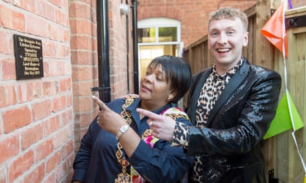 Writing on the wall: the Lord Mayor of Birmingham, Councillor Yvonne Mosquito, unveils a commemorative plaque at the official opening of Joe Lycett’s new kitchen extension named The Mosquito Wing in her honour at his home on 14 May 2019.