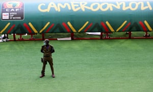 A security officer stands guard at the Olembe stadium in Yaounde, Cameroon, which is to host the opening ceremony of the Africa Cup of Nations.