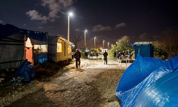 Migrants inside the Calais camp known as the Jungle