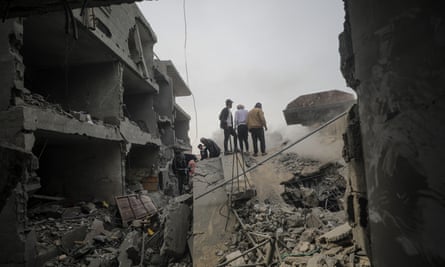Searching for survivors and bodies in the aftermath of an airstrike on Deir al-Balah, February.