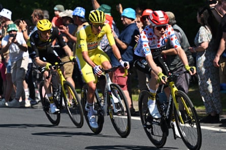 Teammates of Jonas Vingegaard (right) and Tadej Pogacar (centre) battled on the front of the peloton before deciding not to chase the breakaways.