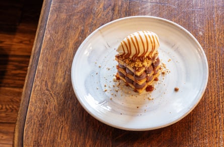 It's already won pudding of the year 2022: Valrhona's dark chocolate millefeuille with salted caramel and toasted hazelnut ice cream, at Dog & Gun, Skelton, Cumbria.