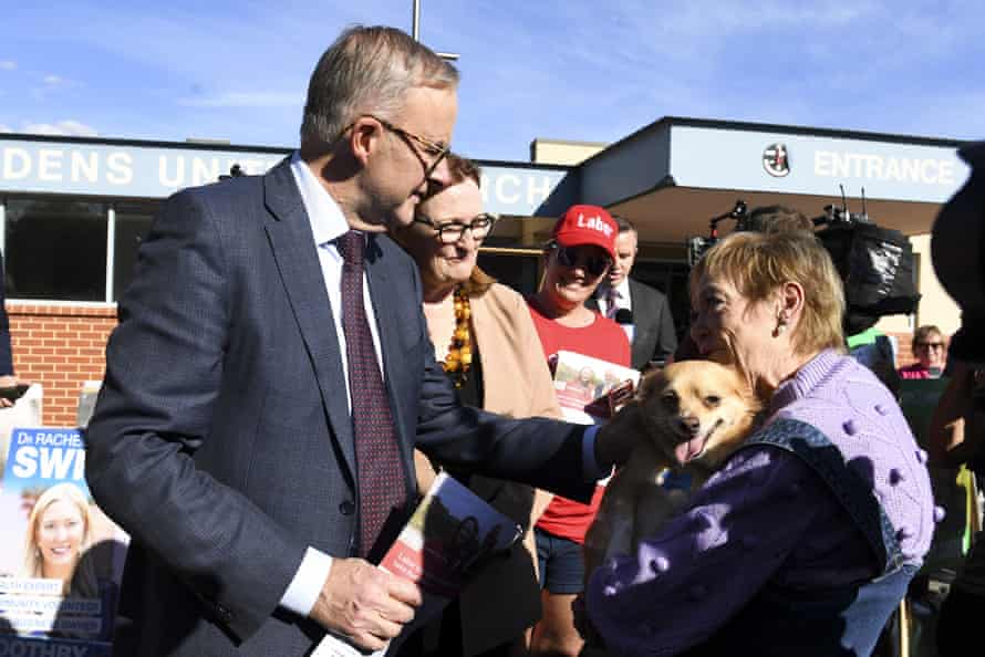 The Labor leader, Anthony Albanese, and Labor candidate for the seat of Boothby, Louise Miller-Frost, speak to voters during a visit to a prepoll booth at Colonel Light Gardens in Adelaide