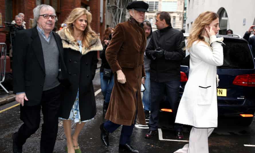 From left, Bill Wyman, Suzanne Wyman and Sir Bob Geldof arrive on Fleet Street.