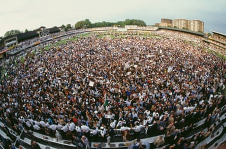 India fans swarm on to the pitch to celebrate their victory over the West Indies in the 1983 Cricket World Cup final.