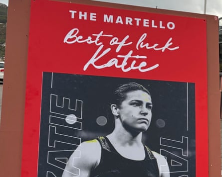 A billboard featuring a black-and-white picture of Katie Taylor in the ring below the words ‘best of luck Katie’
