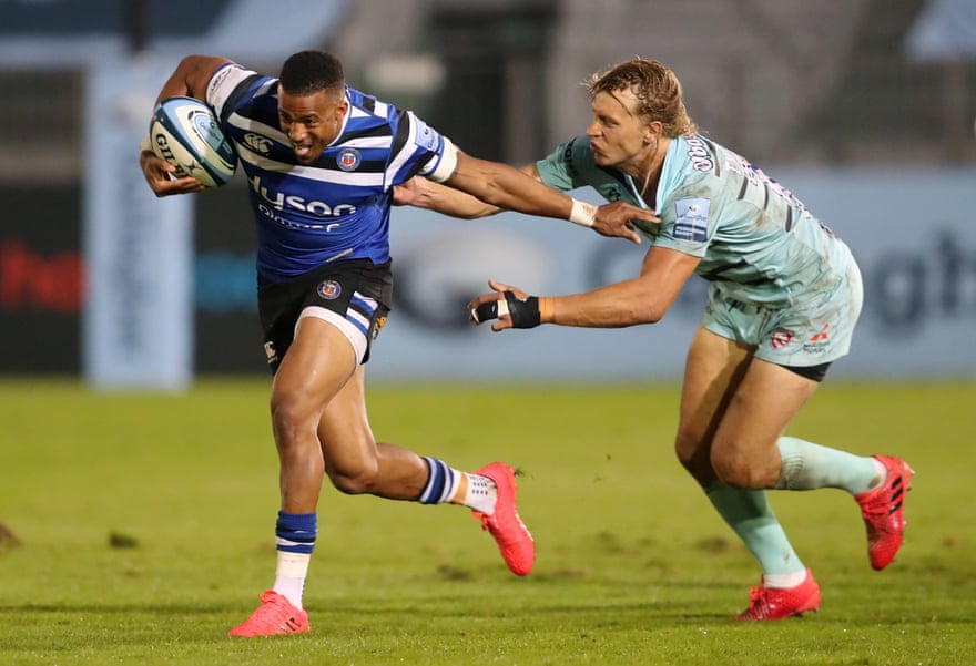 Gloucester's Billy Twelvetrees (right) tackles Bath's Anthony Watson during the Gallagher Premier League match at the Recreation Ground in Bath in September 2020.