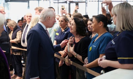 King Charles speaking to nurses.