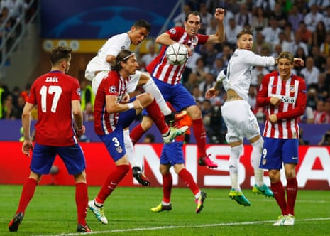 Cristiano Ronaldo heads weakly at goal.
