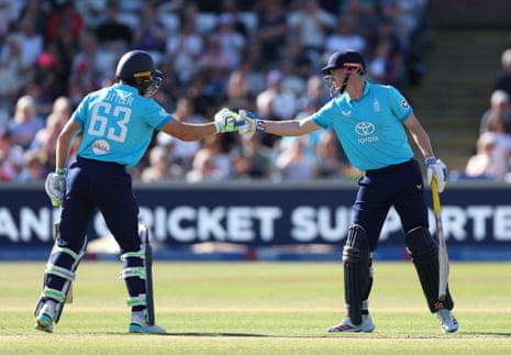 Harry Brook punches gloves with Jos Buttler after reaching his 50