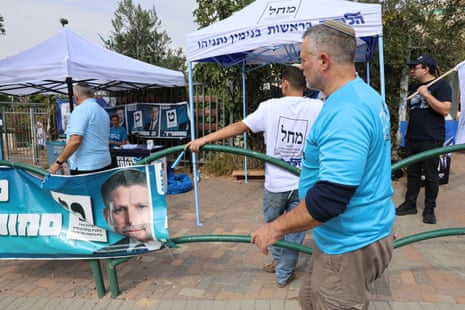 People arrive to vote at a polling station in the settlement of Efrat in the West Bank