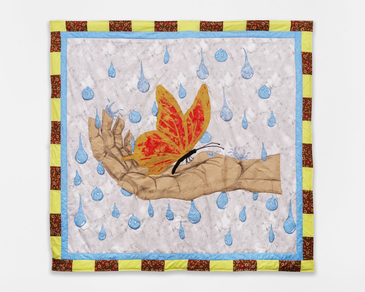 Quilting fabric embroidered with image of butterfly on open hand