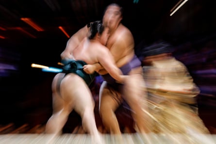 Two fighters clash during their bout