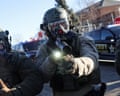 Protest at the Bishop Henry Whipple Federal Building, in MinneapolisA Law enforcement member holds a weapon as they stand guard while people protest outside the Bishop Henry Whipple Federal Building, after the fatal shootings of Renee Nicole Good and Alex Pretti by federal immigration agents, in Minneapolis, Minnesota, U.S., January 30, 2026. REUTERS/Shannon Stapleton TPX IMAGES OF THE DAY