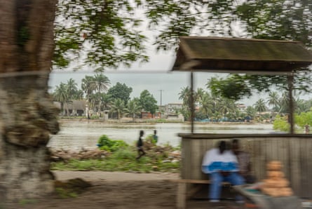 People in the foreground with the lagoon behind