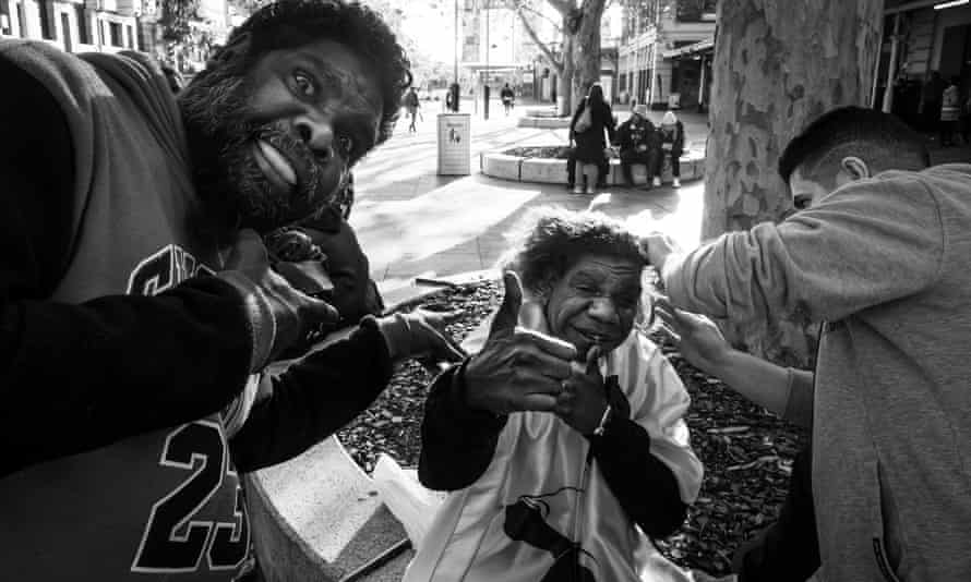 Meet Floki, the street barber of Perth: ‘It’s not just about the haircut’ Two clients smile as ‘Floki’ gets to work