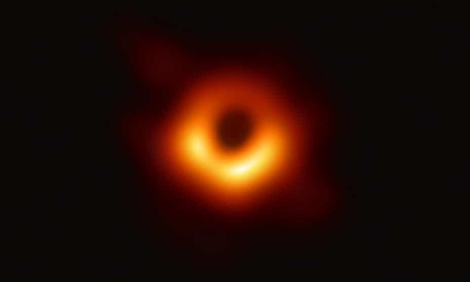 An image captured by the Event Horizon telescope in 2019 of light around  a black hole at the centre of the galaxy M87. 