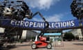 A cherrypicker by a large sign reading 'European elections'