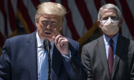 Dr Anthony Fauci looks on as Donald Trump speaks in Washington DC, on 15 May.