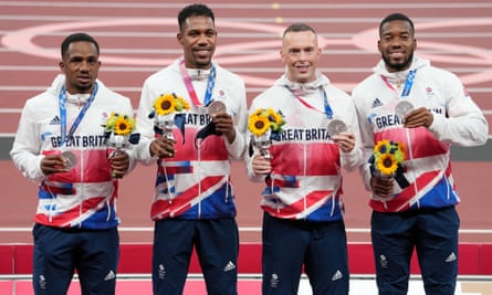 CJ Ujah, Zharnel Hughes, Richard Kilty and Nethaneel Mitchell-Blake show off their Olympic silver medals for the 4 x 100m relay at Tokyo.