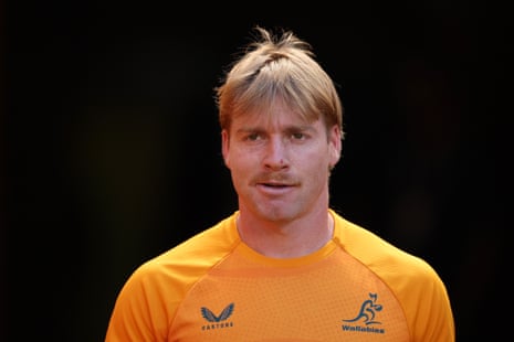 Harry McLaughlin-Phillips, in Wallabies jersey, looks ahead during warm-up before his debut.