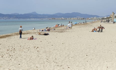 People on Playa de Palma beach in Palma de Mallorca, Spain, last month.