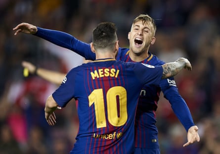 Gerard Deulofeu celebrates with Lionel Messi after scoring for Barcelona in 2017.