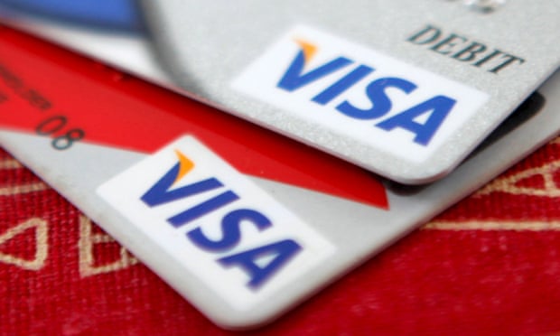 Visa cards on a table Bank Windfalls Bank Windfalls Visa cards on a table