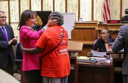 State attorney Katherine Fernandez Rundle hugs Carmen Brown, who had her voting rights restored after the passage of amendment 4.