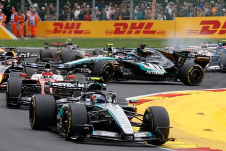 George Russell’s Mercedes spins around and heads for the gravel at Spa