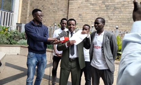 Reuben Kigame, centre, in Nairobi, after Kenya’s Electoral Commission disqualified him from running in the presidential election.