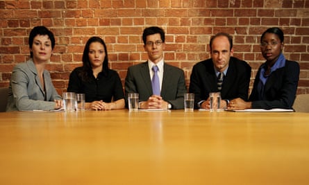 Business people at conference table, portrait. Job interview panel.