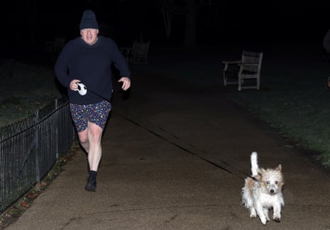 Boris Johnson photographed jogging with his dog Dilyn in St James’s Park this morning.