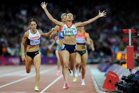 Jessica Ennis wins gold for Britain in the women’s heptathlon and celebrates after crossing the line in the final event, the 800m