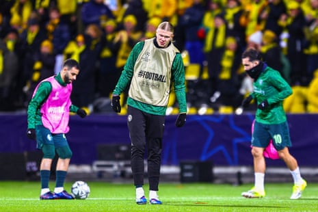 Manchester City’s players warm-up ahead of kick-off.