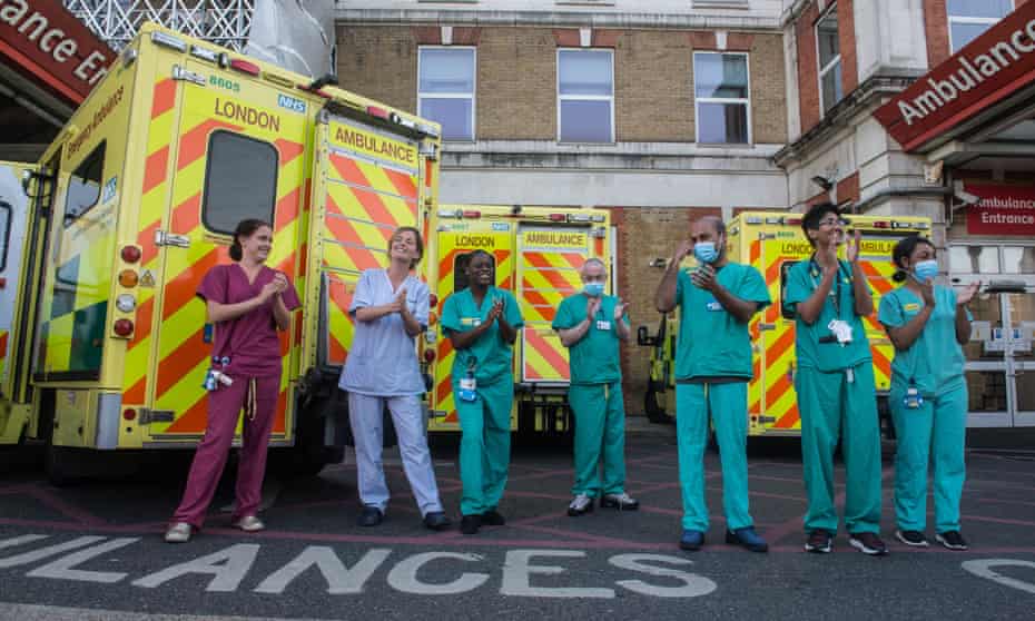 NHS staff in London applaud key workers