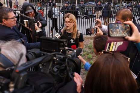 Kara McGee speaks to members of the media outside Manhattan criminal court. McGee, who works in cybersecurity, said she made eye contact with Trump after she told the judge that it would be hard for her to be a juror due to her work schedule.