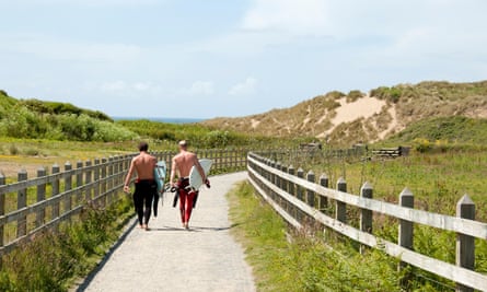 Surf’s up: walking to the beach.