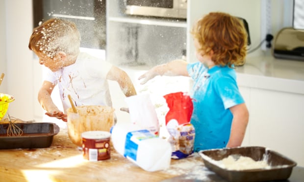 Children baking and throwing flour