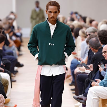 A model, wearing a quarter zip top, walks the runway during the Dior Homme menswear spring/summer 2026 show as part of Paris fashion week on 27 June 2025.