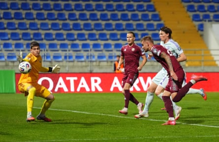Belarus’ Zakhar Volkov scores an ain extremity to double Scotland’s lead