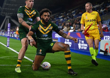 Josh Addo-Carr celebrates after scoring Australia's third try, and his hat-trick.