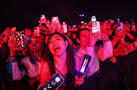 Fans watching Le Sserafim at Coachella in April 2024.