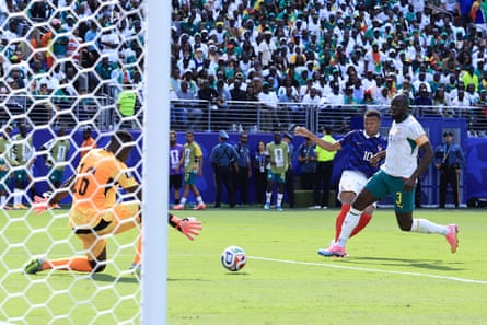 Kylian Mbappé swivels and shoots to open the scoring for France