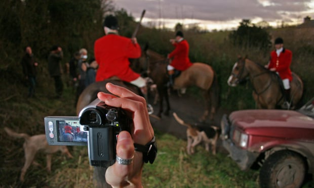 The South Herefordshire Hunt being filmed by a hunt saboteur, Herefordshire, UK