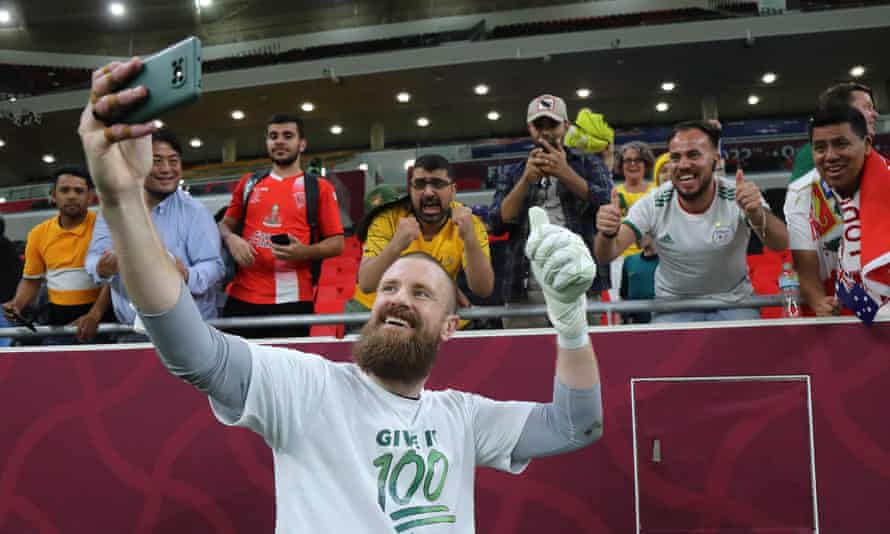 Andrew Redmayne poses for a photo with fans.
