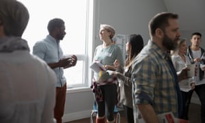 People talking during a support group meeting.
